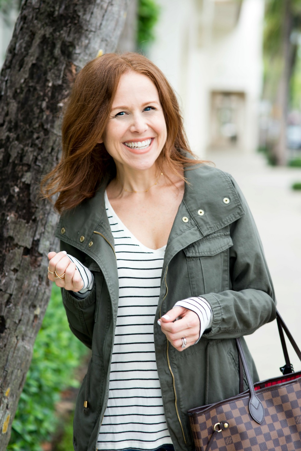 Easy fall outfit uniform for every girl -- cargo jacket, stripes, denim & sneaks // the modern savvy, a life & style blog