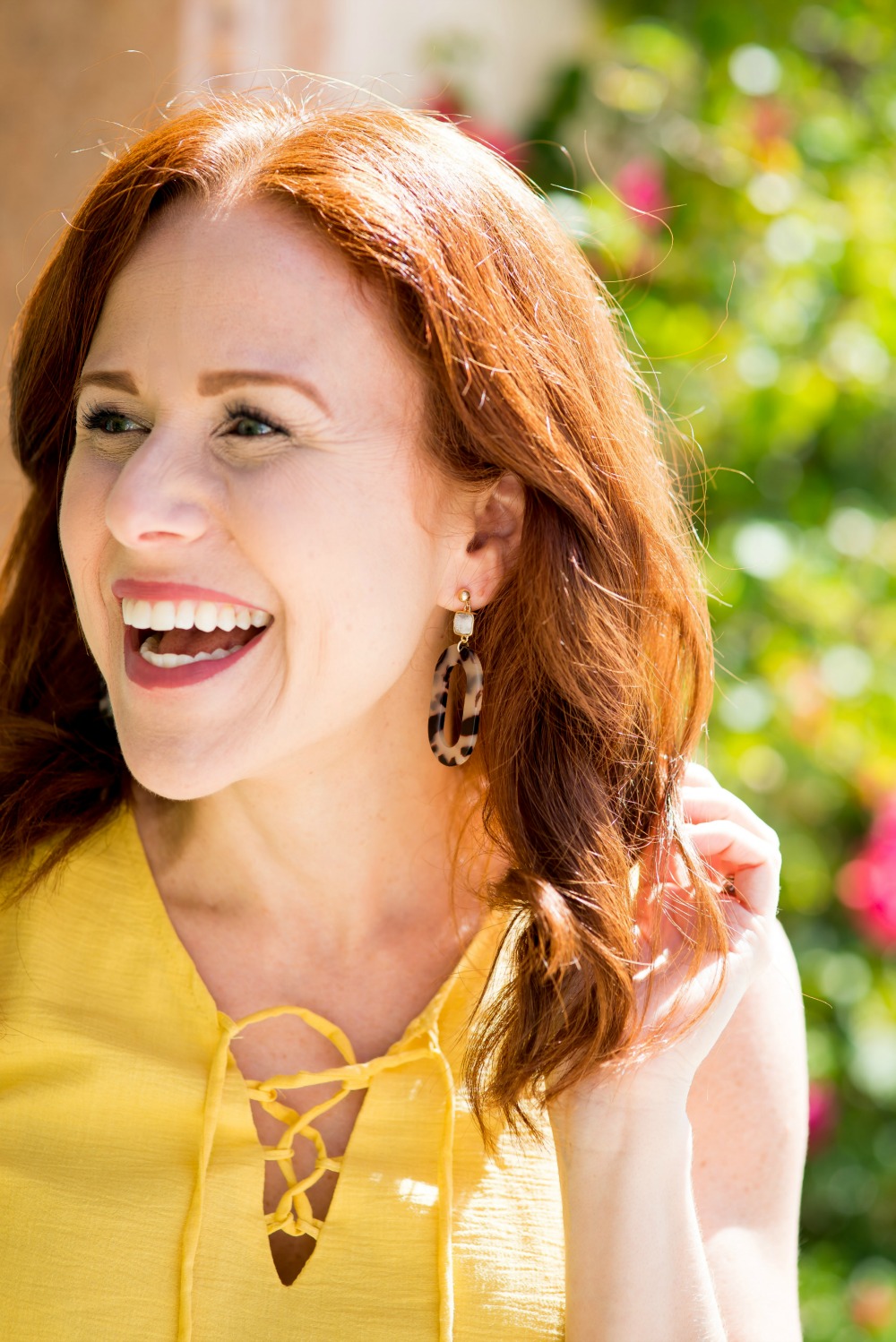 Statement earrings, this pair by Alexandra Gioia - Cute Yellow Dress styled by popular Florida fashion blogger, The Modern Savvy