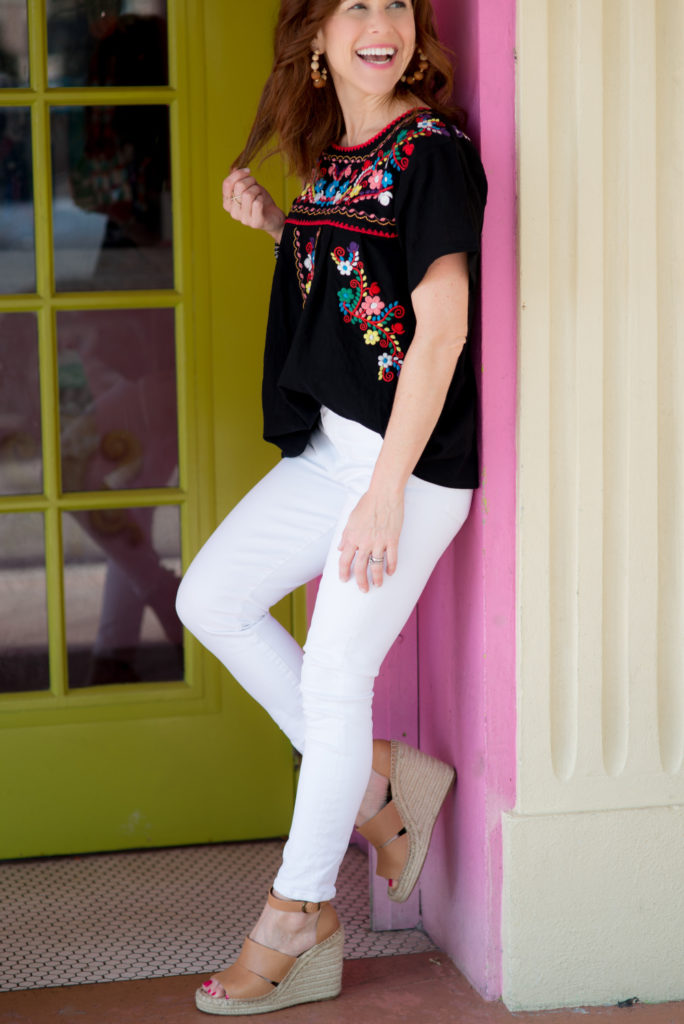 Cute Spring Tops featured by top US fashion blog The Modern Savvy; Image of a woman wearing Amazon top, Citizens of Humanity denim and Treasure & Bond wedges.