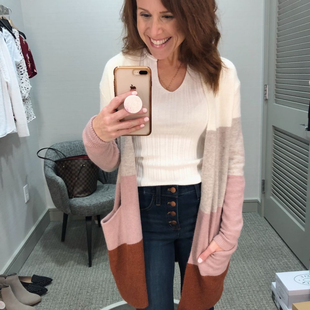 Nordstrom Anniversary Sale 2019: Fitting Room Try-On Session & My Favorite Under $100 finds! by popular Florida fashion blog, The Modern Savvy: image of woman inside a Nordstrom dressing room wearing a MADEWELL RYDER CARDIGAN, VINCE CAMUTO BOOTIES and Madewell 10-Inch High Waist Skinny Jeans: Button Front Edition.