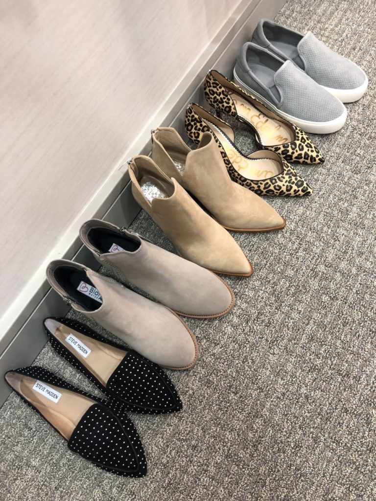 Nordstrom Anniversary Sale 2019: Fitting Room Try-On Session & My Favorite Under $100 finds! by popular Florida fashion blog, The Modern Savvy: image of STEVE MADDEN feather stud loafers, BLONDO BOOTIES, VINCE CAMUTO BOOTIES, SAM EDELMAN LEOPARD PUMPS, and UGG SLIDE SNEAKERS lined up in a row.