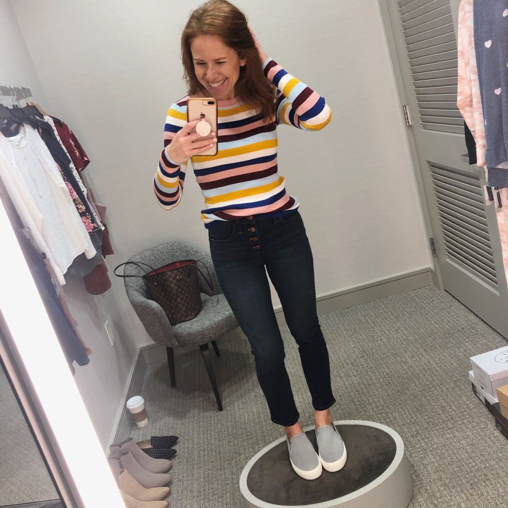 Nordstrom Anniversary Sale 2019: Fitting Room Try-On Session & My Favorite Under $100 finds! by popular Florida fashion blog, The Modern Savvy: image of woman inside a Nordstrom dressing room wearing a Halogen Ribbed Sweater, Ugg Sneakers, and Madewell 10-Inch High Waist Skinny Jeans: Button Front Edition