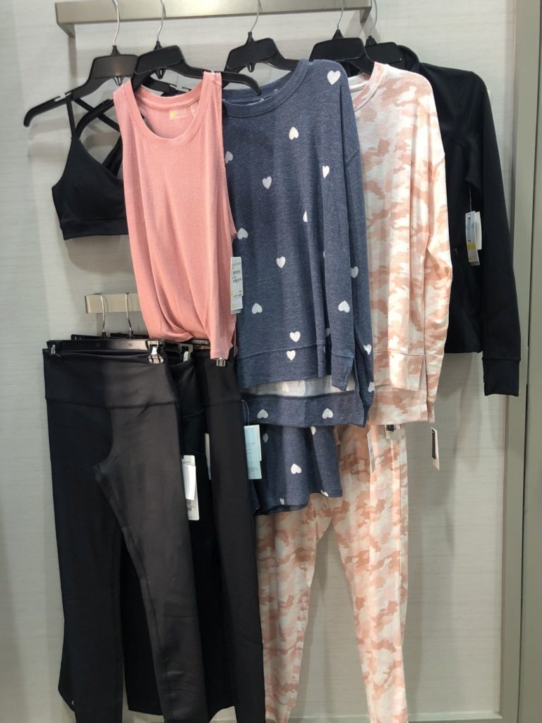 Nordstrom Anniversary Sale 2019: Fitting Room Try-On Session & My Favorite Under $100 finds! by popular Florida fashion blog, The Modern Savvy: image of lounge and athletic wear hanging on a clothing rack in a Nordstrom dressing room.