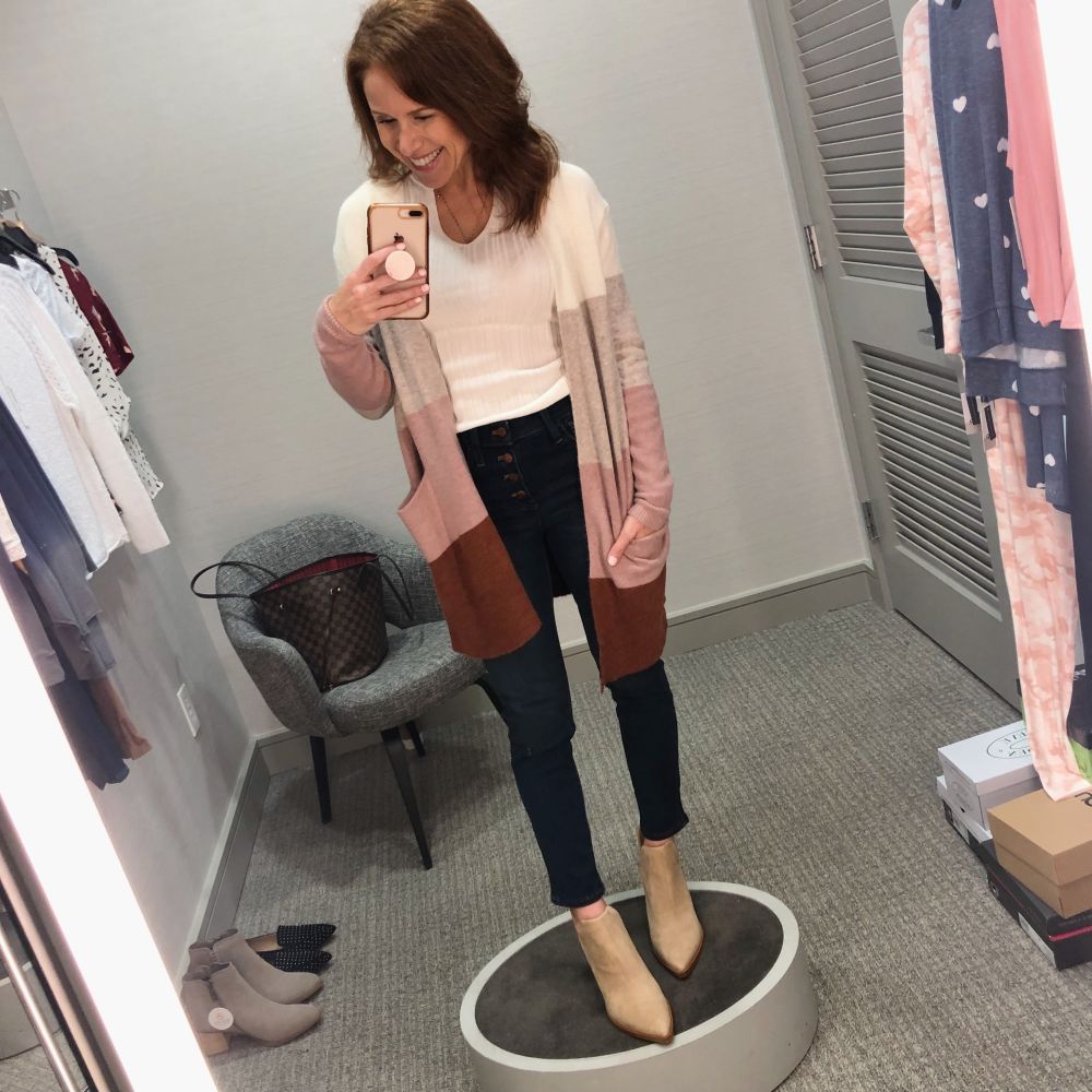 Nordstrom Anniversary Sale 2019: Fitting Room Try-On Session & My Favorite Under $100 finds! by popular Florida fashion blog, The Modern Savvy: image of woman inside a Nordstrom dressing room wearing a MADEWELL RYDER CARDIGAN, VINCE CAMUTO BOOTIES and Madewell 10-Inch High Waist Skinny Jeans: Button Front Edition.