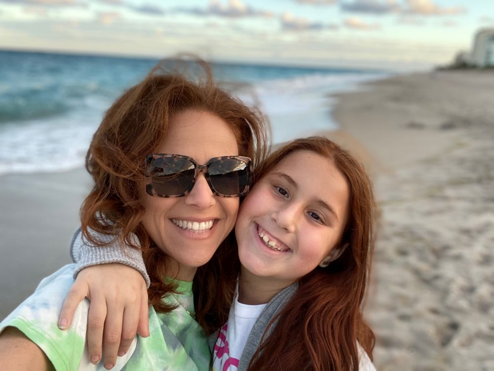 When the Little Moments in Life Are Really the Big Moments by popular Florida life and style blog, The Modern Savvy: image of a mom and daughter standing together on the beach.