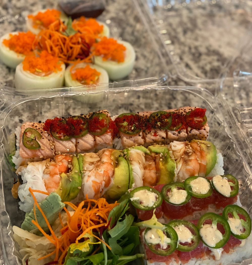 How to Feel Happy Again by popular Florida lifestyle blog, The Modern Savvy: image of takeout sushi. 